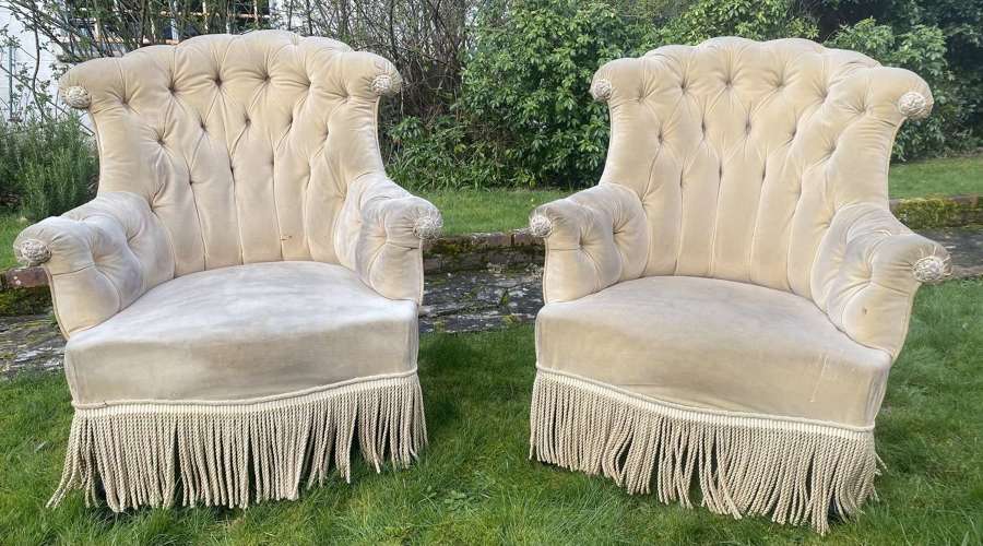 Pair of button backed armchairs