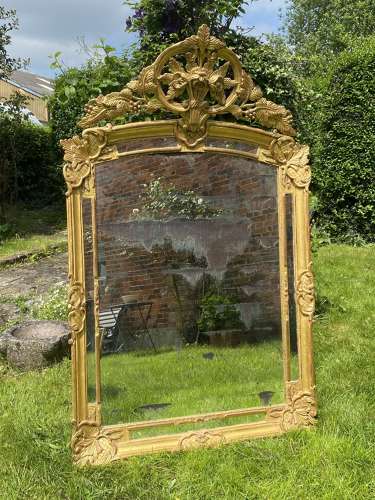 Large carved giltwood margin mirror
