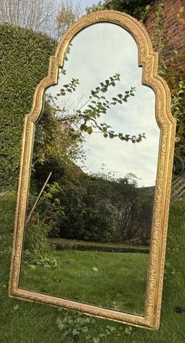 Arched gilt mirror