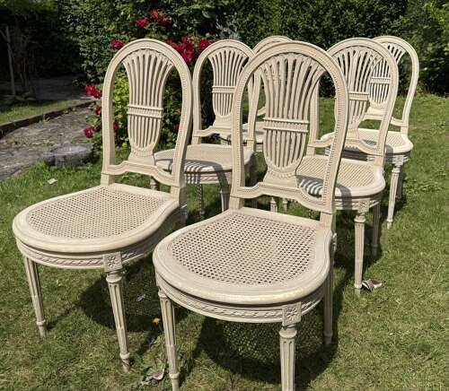 Set of six caned and painted dining chairs