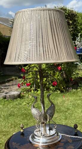 Silver plate lamp with storks