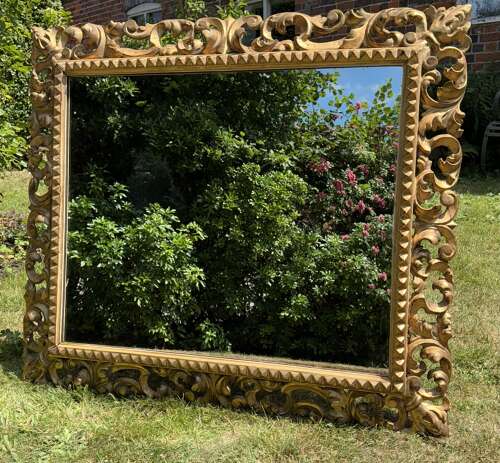 Carved giltwood Florentine mirror