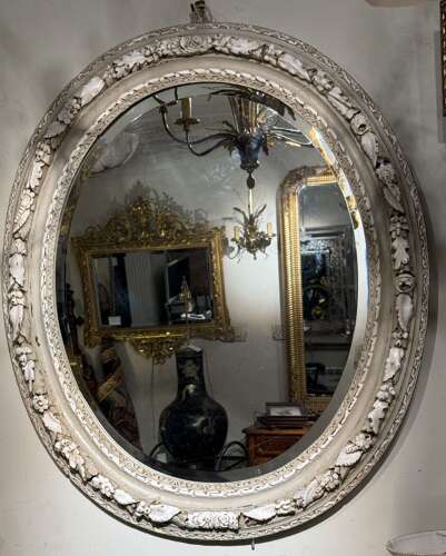 Carved oak painted mirror