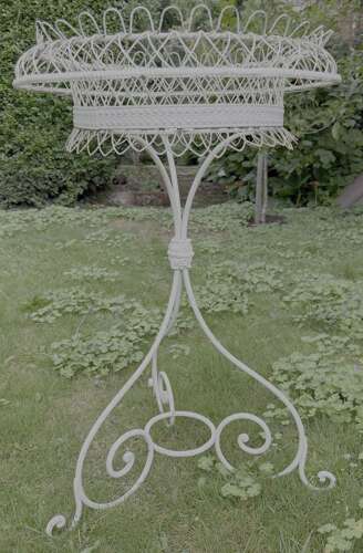 Wire work and wrought iron garden jardiniere