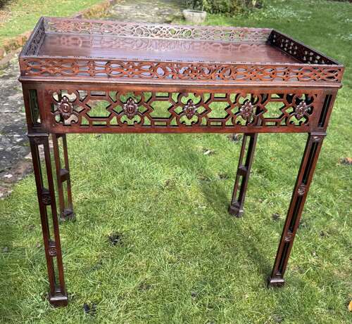 Antique fretwork silver table