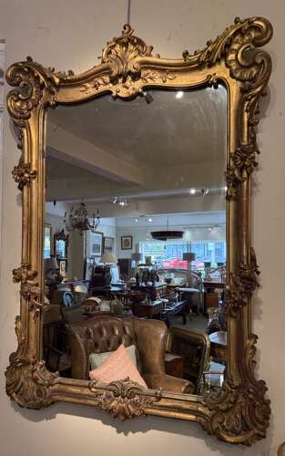 An 18th Century carved giltwood wall mirror