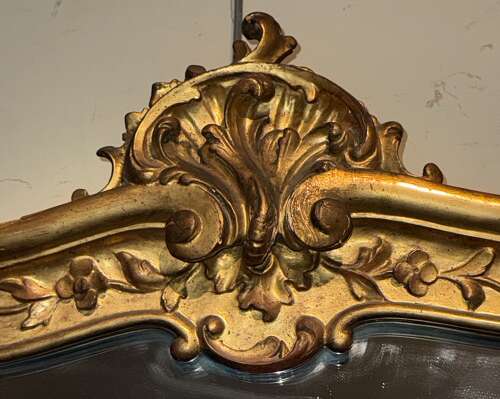 An 18th Century carved giltwood wall mirror