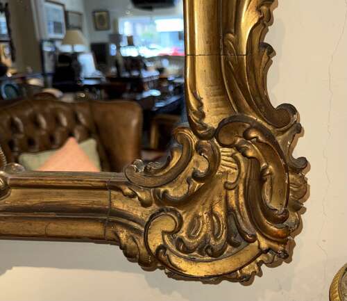 An 18th Century carved giltwood wall mirror