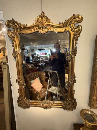 An 18th Century carved giltwood wall mirror